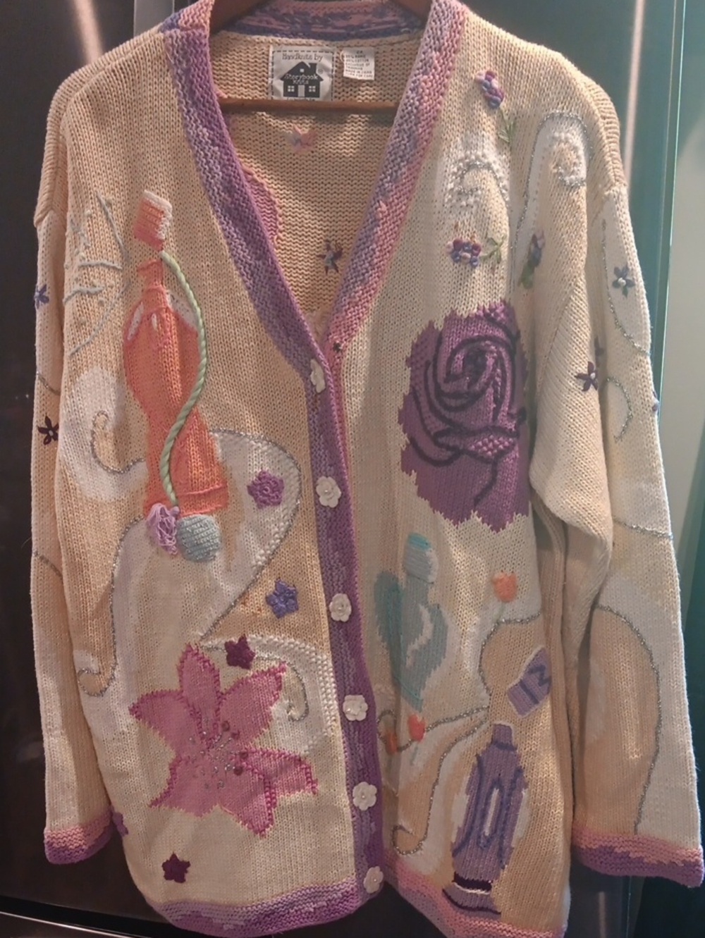 Storybook Knits Beige Cardigan with Purple and Pink Floral Appliqués